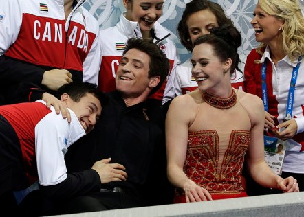 Patrick Chan and Team Canada wait with Tessa and Scott to see their results