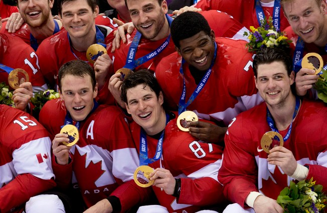 Team Canada captain Sidney Crosby celebrates with other Canada players after defeating Team Sweden to win the gold medal in Olympic final action at the Sochi 2014 Olympic Winter Games Sunday February 23, 2014 in Sochi, Russia. THE CANADIAN PRESS/Paul Chiasson