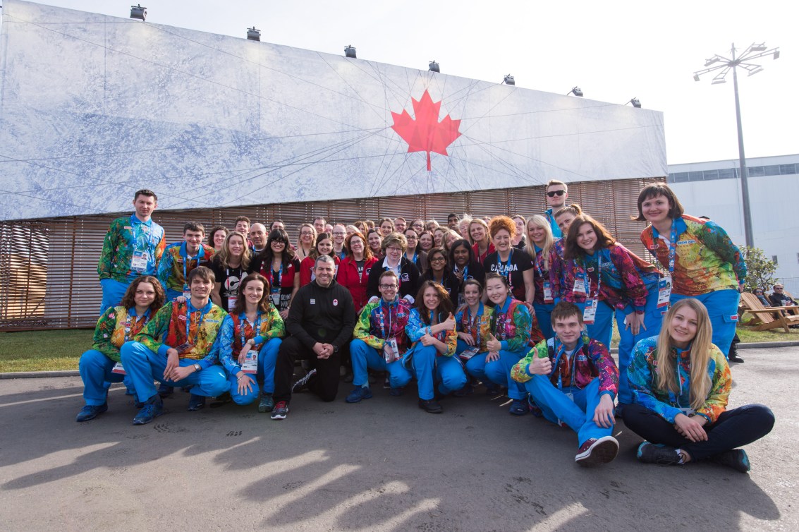 Volunteers in front of Canada Olympic House at Sochi 2014