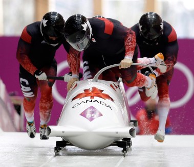 Team Canada members competing in bobsleigh