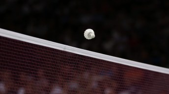 Shuttlecock passing over a net