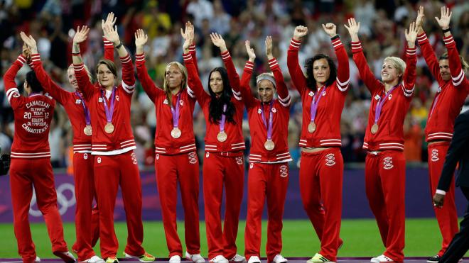 Canadian players receive their bronze medals at London 2012.