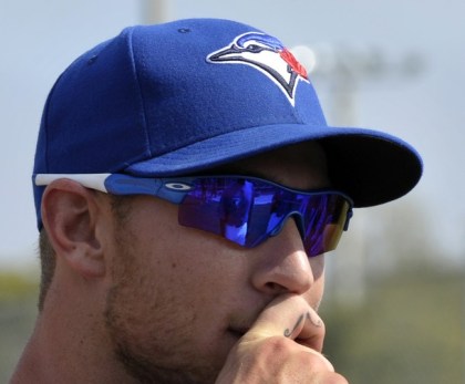 Blue Jays infielder shows the moustache tattoo on his finger to teammates during practice at their MLB American League spring training facility in Dunedin Brett Lawrie. Photo: http://bit.ly/1ihUJcD