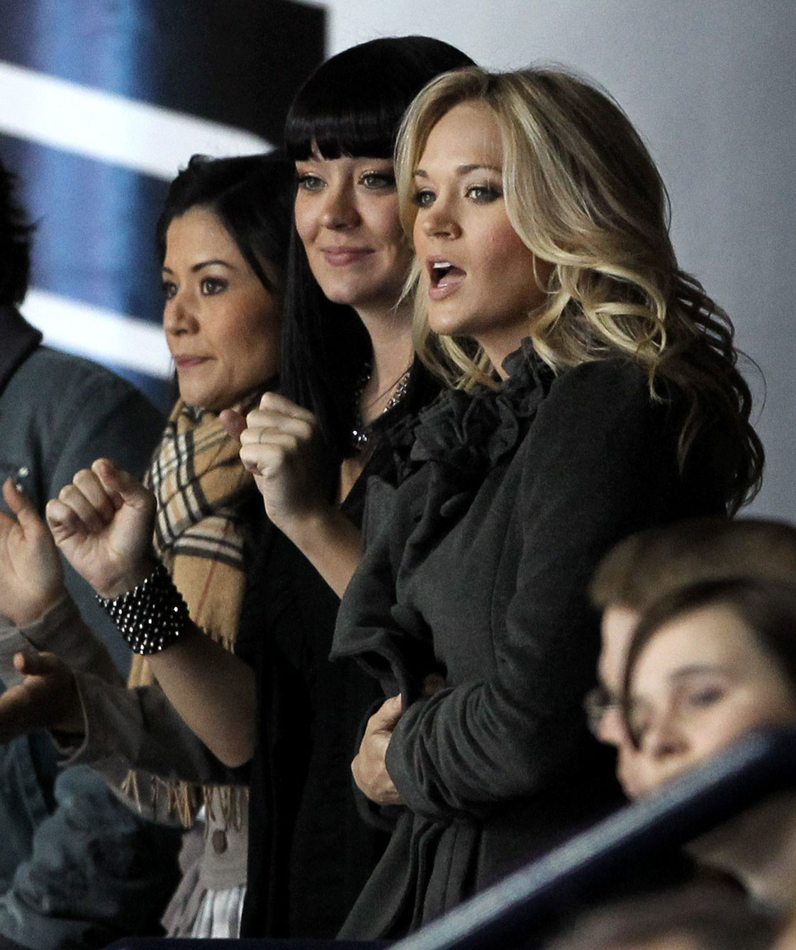 Carrie Underwood, right, supporting her Predators. Photo: CP