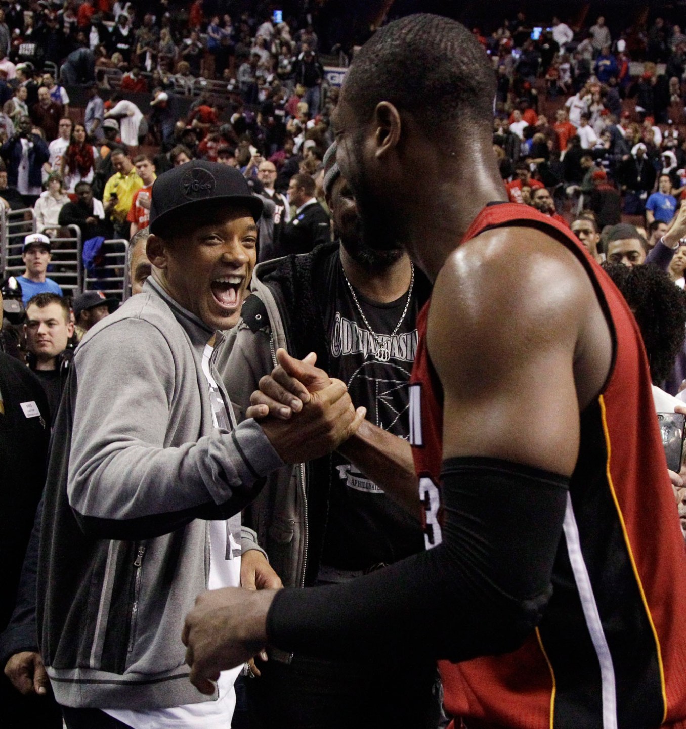 Will Smith shaking hands with Dwyane Wade. Photo: CP