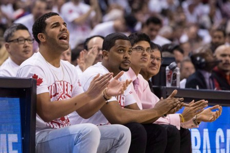 Drake cheering on his Raps from his sideline post. Photo: CP