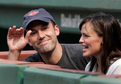 Ben Affleck and Jennifer Garner sitting beside the home team dugout at a Red Sox game. Photo: CP