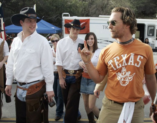 Matthew McConaughey says hi to fans before a Longhorns game. Photo: CP