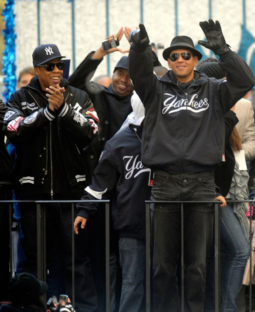 Jay-Z and Alex Rodriguez celebrate the Yankees 2009 World Series win during the parade. Photo: CP