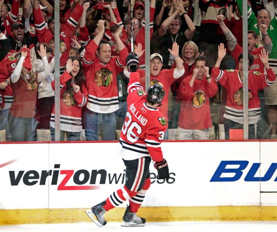 After scoring a goal in the 2010 Stanley Cup Finals, Dave Bolland salutes the Blackhawks fans, including Vince Vaughn. Photo: CP