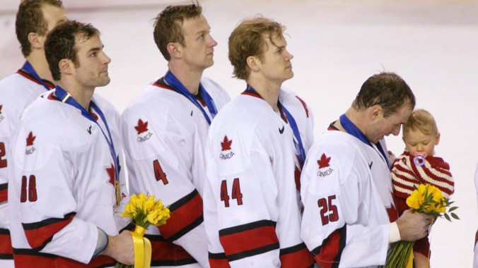 Rob Blake (no. 4) lines up for the Canadian national anthem with teammates following Canada's 5-2 golden win over the United States at Salt Lake City 2002.