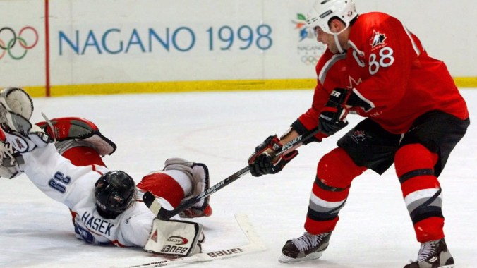 Dominik Hasek Hall of Famer Dominik Hasek of the Czech Republic stops Eric Lindros in the 1998 Olympic men's ice hockey semifinal. Hasek stopped all five shots in the shootout helping to beat Canada 2-1 en route to Olympic gold.