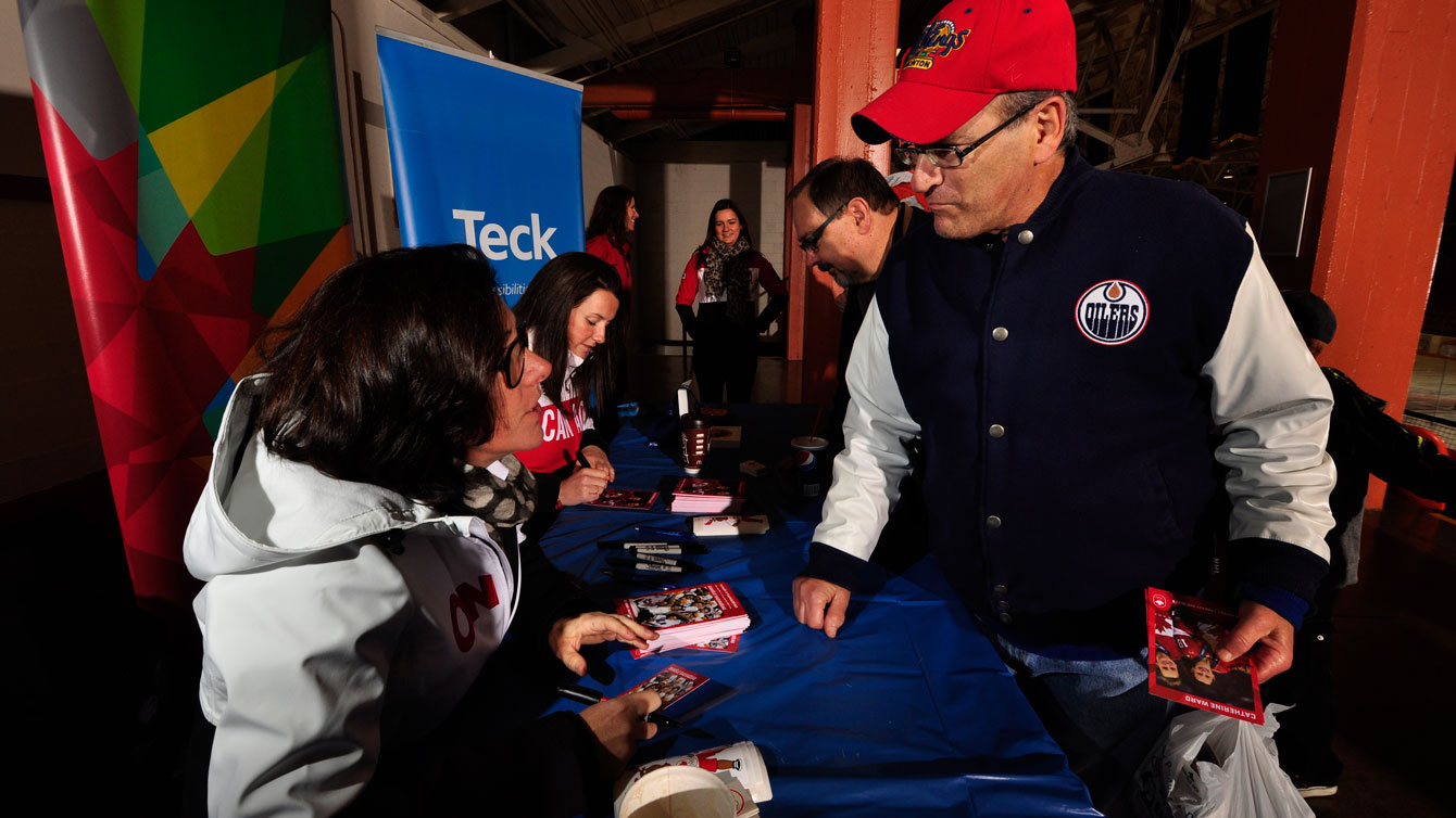 Fans had a chance to meet the Olympic athlete and coach prior to the Smoke Eaters game.
