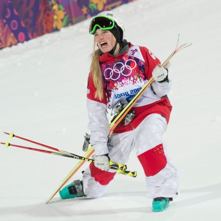 Justine Dufour-Lapointe celebrates her gold medal in women's moguls