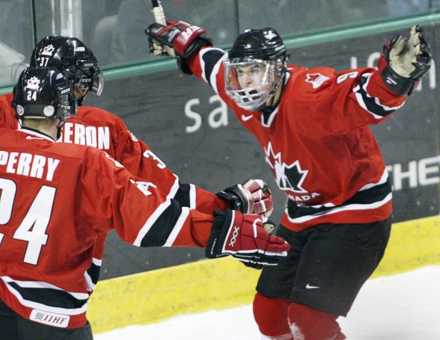 SidneyCrosby, right, celebrates a goal with Patrice Bergeron and Corey Perry during the 2005 World Juniors (Photo: CP)