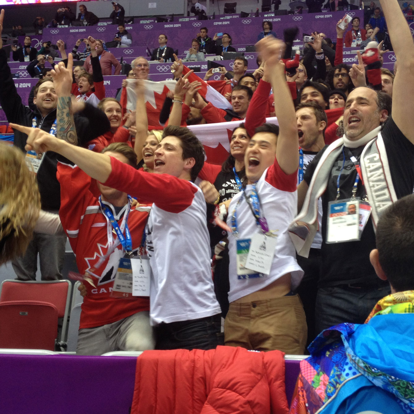 Moir and Chan celebrate at the Women's gold medal hockey final. 