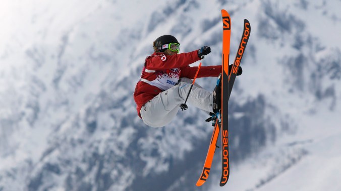 Dara Howell grabs the front of her skis on way to landing the final jump of her winning run at Sochi 2014.