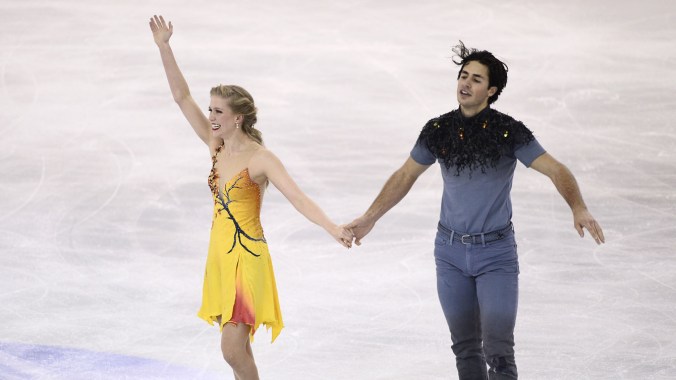Kaitlyn Weaver and Andrew Poje Kaitlyn Weaver and Andrew Poje at the conclusion of the free dance before being crowned ice dance champions at the Grand Prix Final in Barcelona, Spain.
