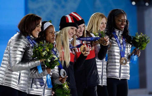 Kaillie Humphries and Heather Moyse at the victory ceremony for bobsleigh in Sochi.