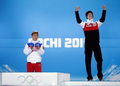 Charle Cournoyer (R) won the 500m bronze medal in short track.