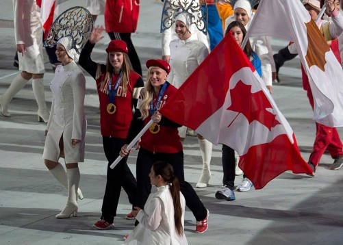 Heather Moyse (L) and Kaillie Humphries (R) were selected as Canada's closing ceremony flag bearers in Sochi.