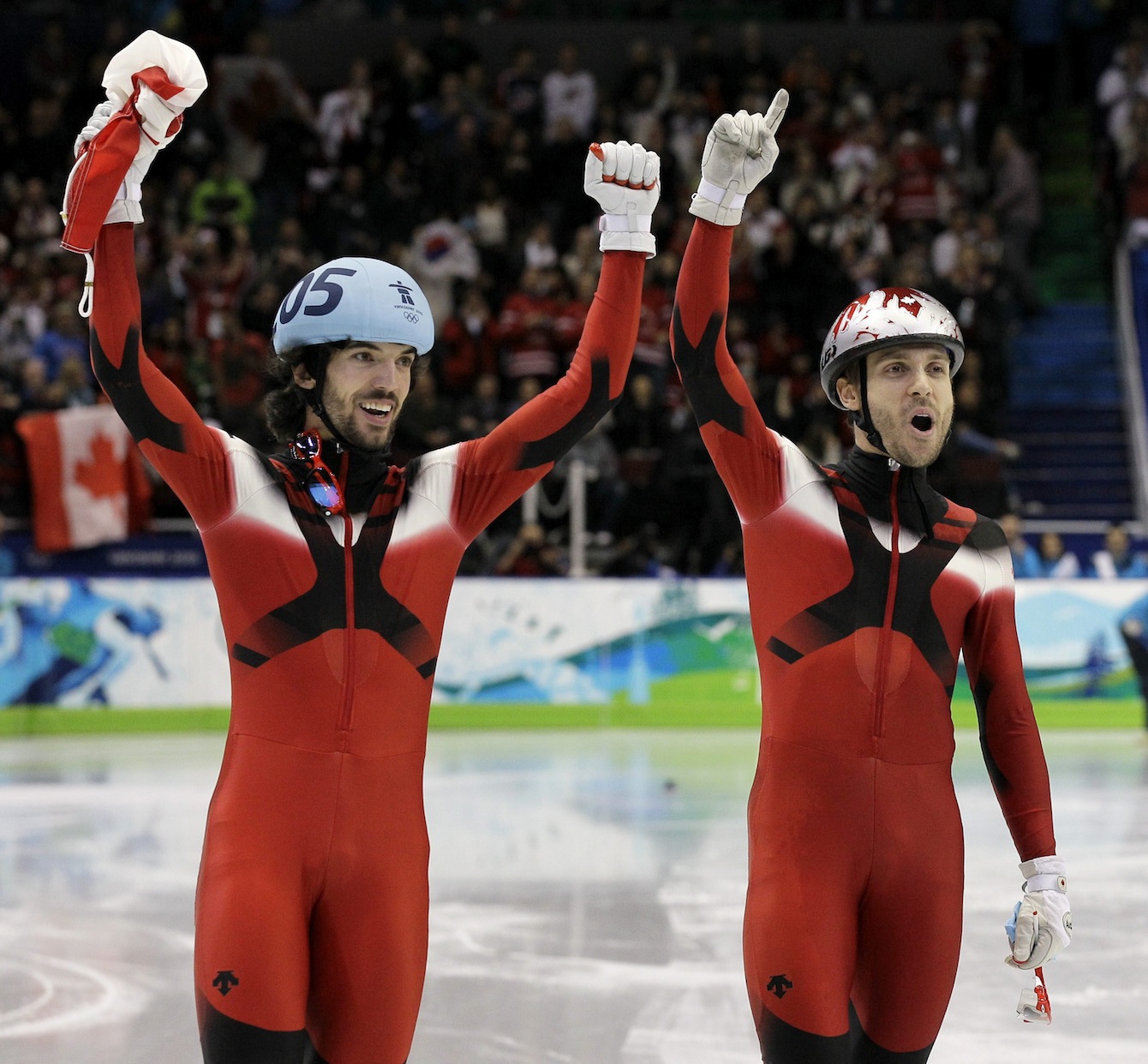 Canada’s gold medalist Charles Hamelin, left, reacts with Canada’s bronze medalist François-Louis Tremblay, right, after the final of the men’s 500-metre short-track speed-skating event at the 2010 Olympics in Vancouver, British Columbia, on Friday, February 26, 2010. (AP Photo/Emy Sancetta)