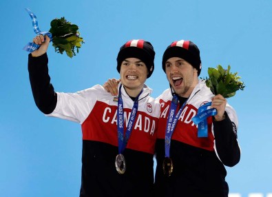 Mikaël Kingsbury (L) and Alex Bilodeau (R) on the podium in Sochi.