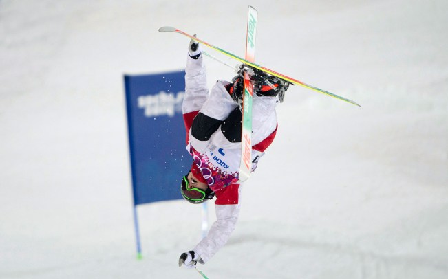 Alex Bilodeau during a moguls run at Sochi 2014.