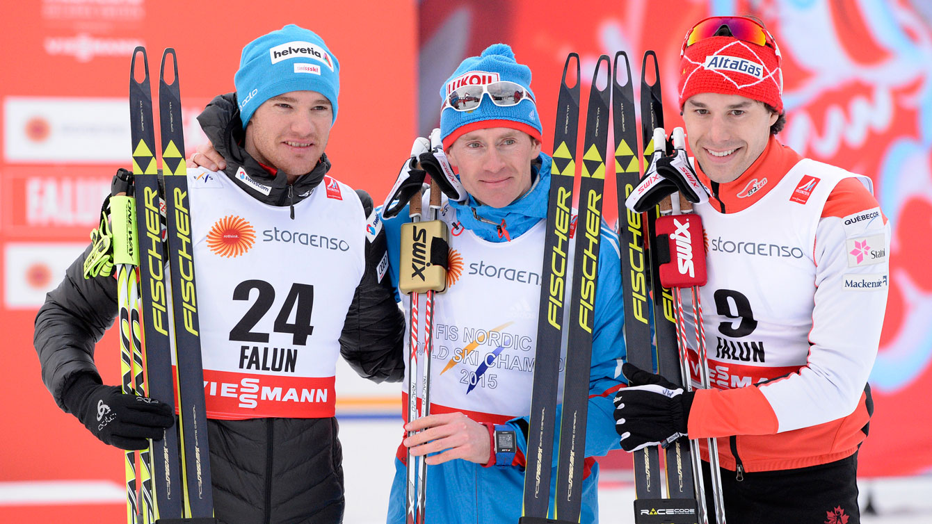 Alex Harvey (right) on the podium with Maxim Vylegzhanin (centre) and Dario Cologna (photo: Falun2015.com). 