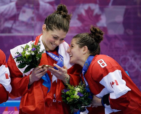 Rebecca Johnston (L) and Laura Fortino (R) celebrate in Sochi.