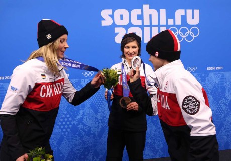 Dara Howell (L), Kim Lamarre (middle) and Mikaël Kingsbury with their medals at a press conference in Sochi.