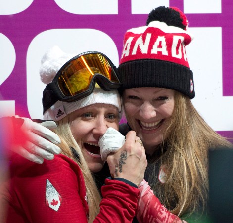 Kaillie Humphries and Heather Moyse react as it becomes clear they successfully defended their Olympic title at Sochi 2014.