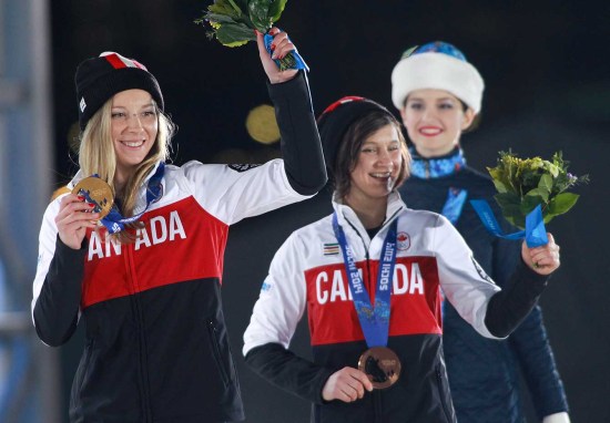 Dara Howell (L) and Kim Lamarre (R) during their medal ceremony for ski slopestlyle.