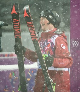 Mike Riddle is all smiles upon learning that he's an Olympic medallist.