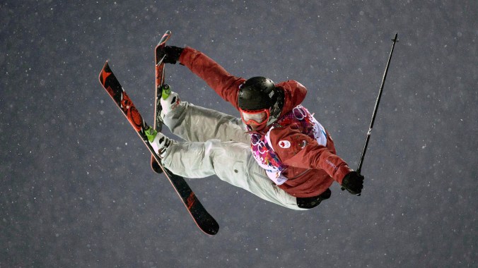 Mike Riddle in action at the ski halfpipe competition at Sochi 2014