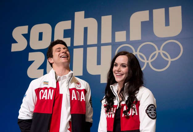 Tessa Virtue and Scott Moir celebrate their silver medal (Sochi)