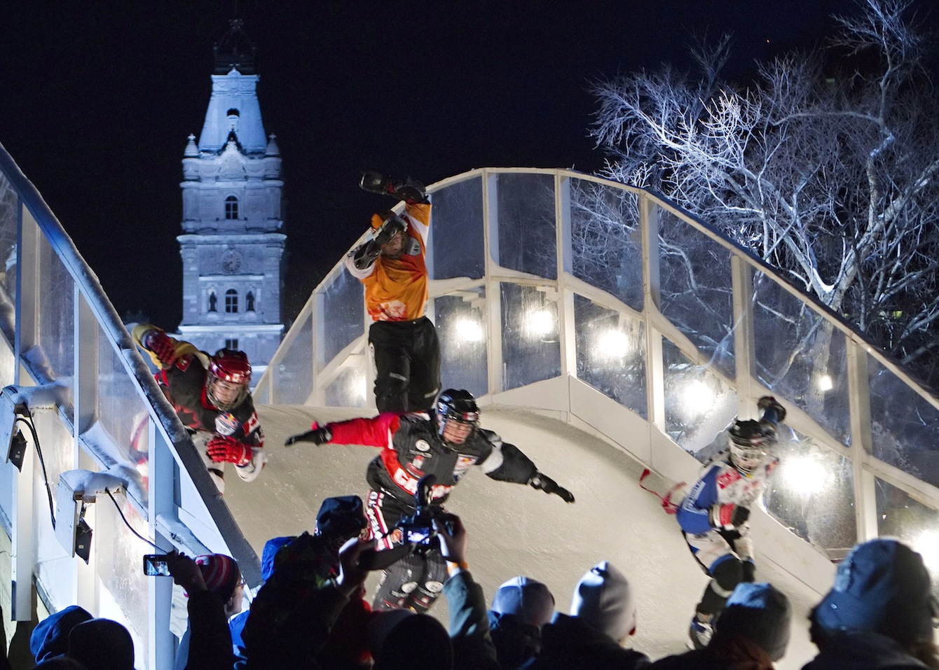 These four competitors deal with a tricky hill feature. (Photo: Canadian Press)