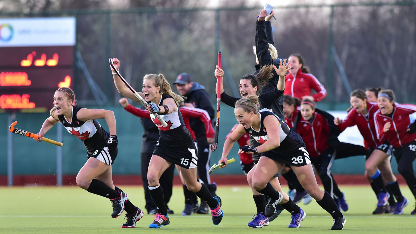 Canadian women celebrate shootout win over Chile in Ireland, March 21, 2015. Photo via FIH - International Hockey Federation.
