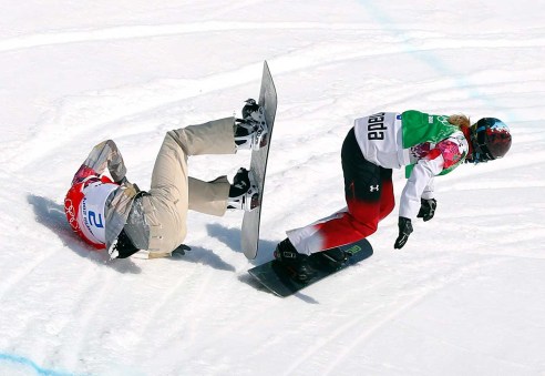 Maltais sneaks around American Lindsey Jacobellis, in a snowboard cross semifinal at Sochi 2014.