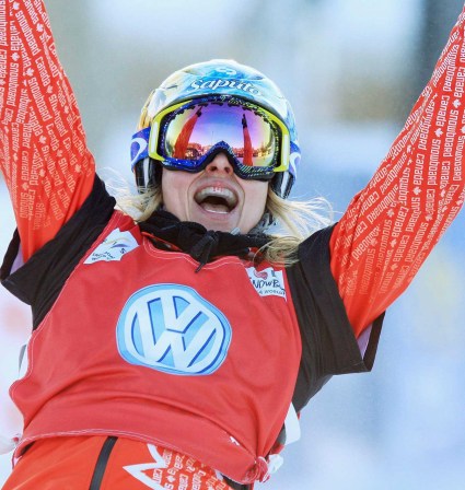Dominique Maltais of Canada celebrates finishing first in the final, at the FIS Snowboard Cross World Cup race at Blue Mountain in Collingwood, Ontario, Wednesday, February 8, 2012. THE CANADIAN PRESS/Dave Chidley