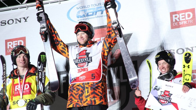 Mike Riddle atop the podium in Tignes to end the 2014-15 season (photo via Chad Buchholz/FIS).
