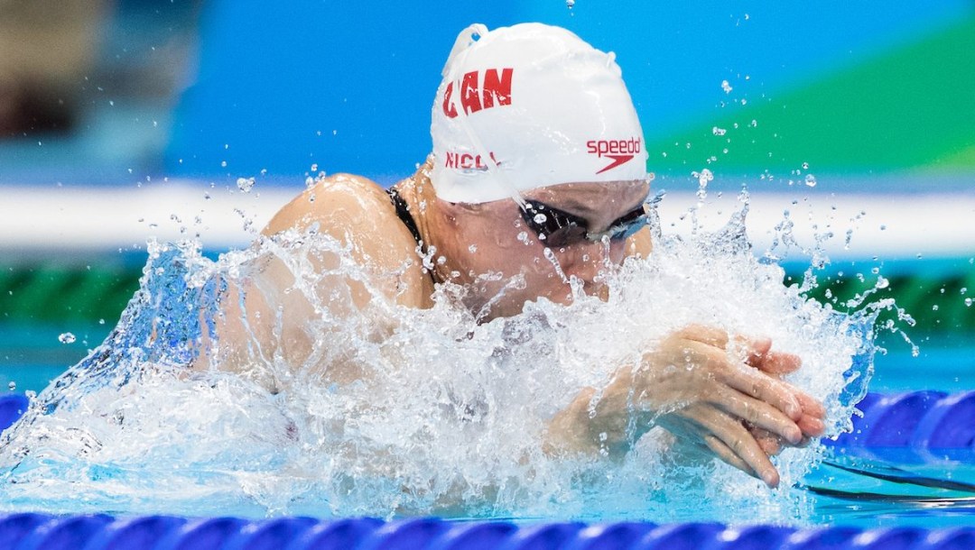 Rachel Nicol swims in a breaststroke race