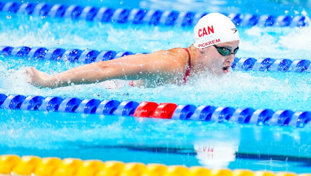 Sydney Pickrem swims butterfly stroke in a race