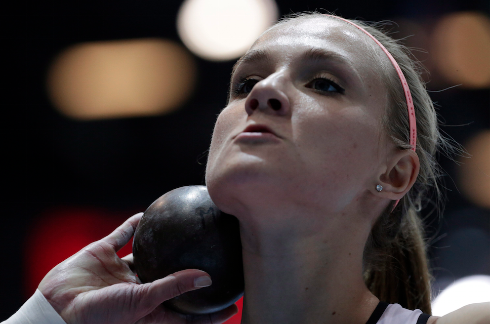 Canada's Brianne Theisen Eaton makes an attempt in the shot put of the women's pentathlon during the Athletics Indoor World Championships in Sopot, Poland, Friday, March 7, 2014. (AP Photo/Matt Dunham)