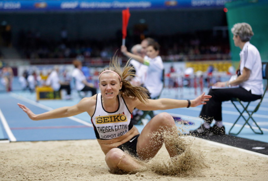 Canada's Brianne Theisen Eaton makes an attempt in the long jump of the women's pentathlon during the Athletics Indoor World Championships in Sopot, Poland, Friday, March 7, 2014. (AP Photo/Matt Dunham)