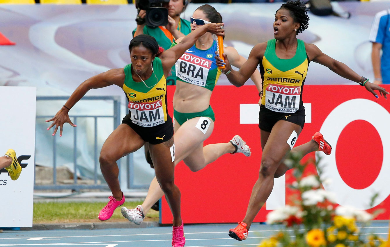 Shelly-Ann Fraser-Pryce takes the baton for the final leg of the women's 4x100m relay at Moscow 2013. 
