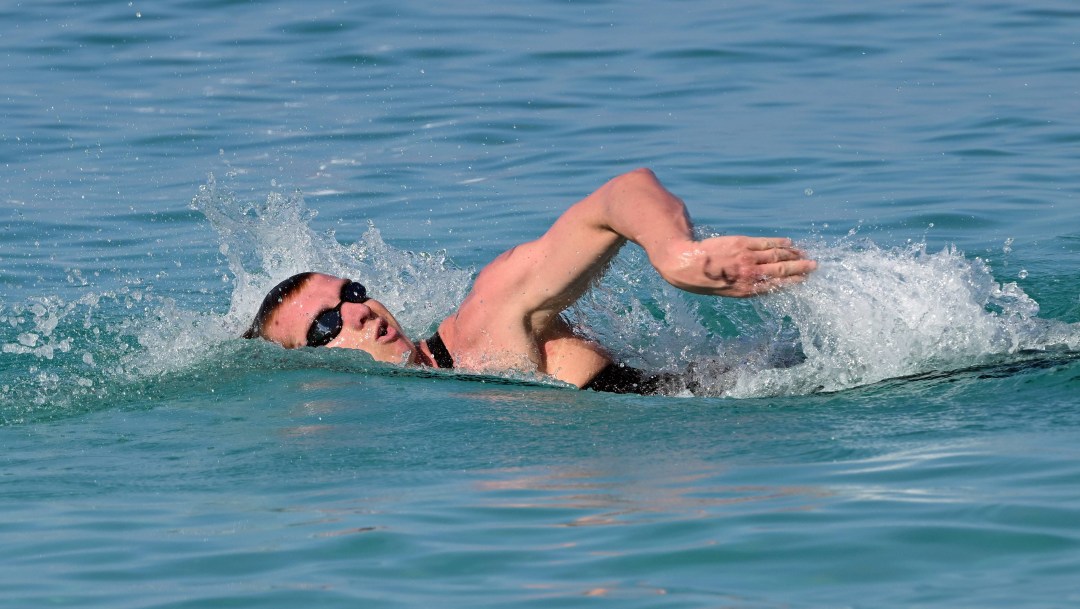 Eric Hedlin competes in open water swimming