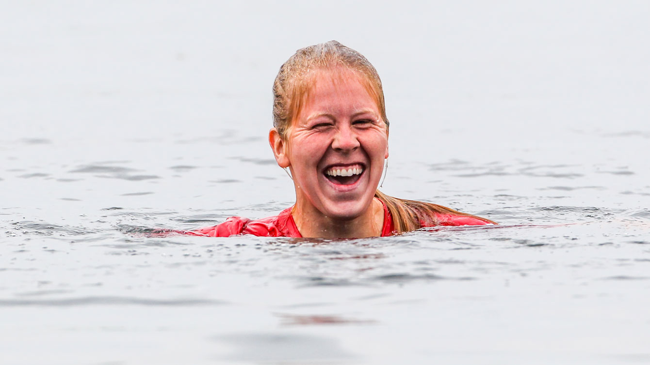 Laurence Vincent-Lapointe takes a dip after winning the C1 200 at ICF Sprint World Cup in Duisburg, Germany on May 24, 2015 (Photo: Balint Vekassy).