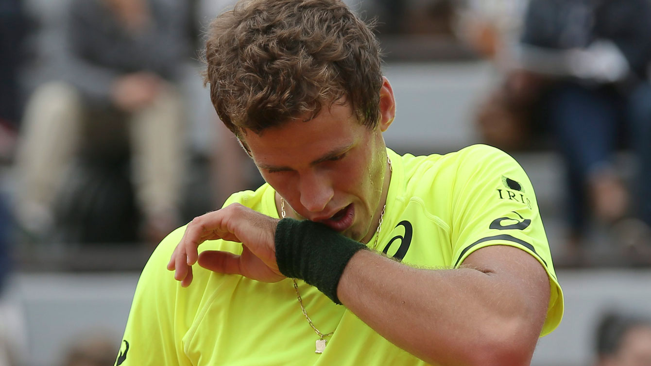 Vasek Pospisil visibly dejected at the 2015 French Open, in a singles match he would lose Joao Sousa. 