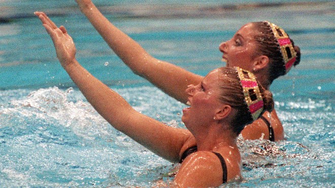 Canada's Carolyn Waldo (front) and Michelle Cameron swim for Olympic gold in the synchronized swimming duet event at the 1988 Olympic games in Seoul. (CP PHOTO/ COC/ Ted Grant)